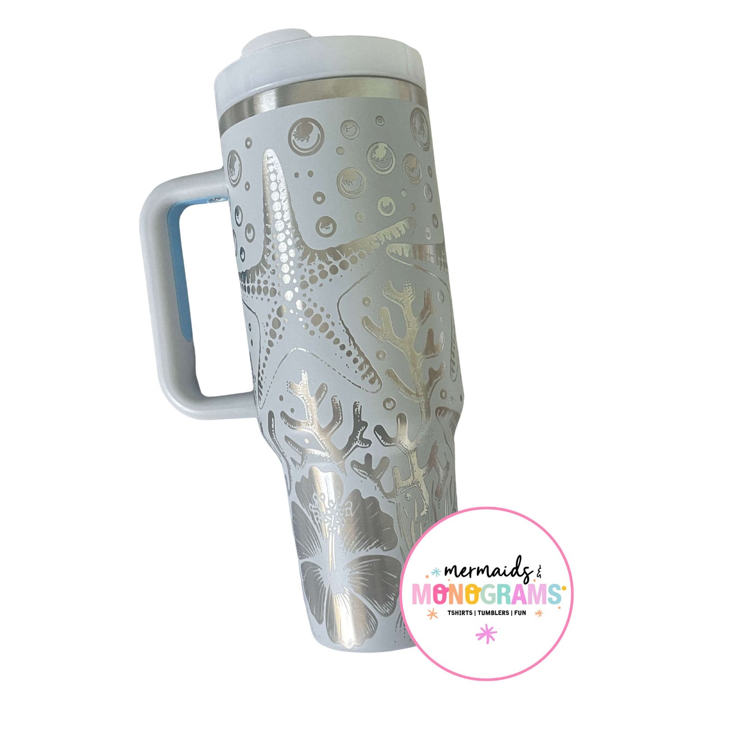 Side view of 40oz tumbler with beachy etching and ergonomic handle