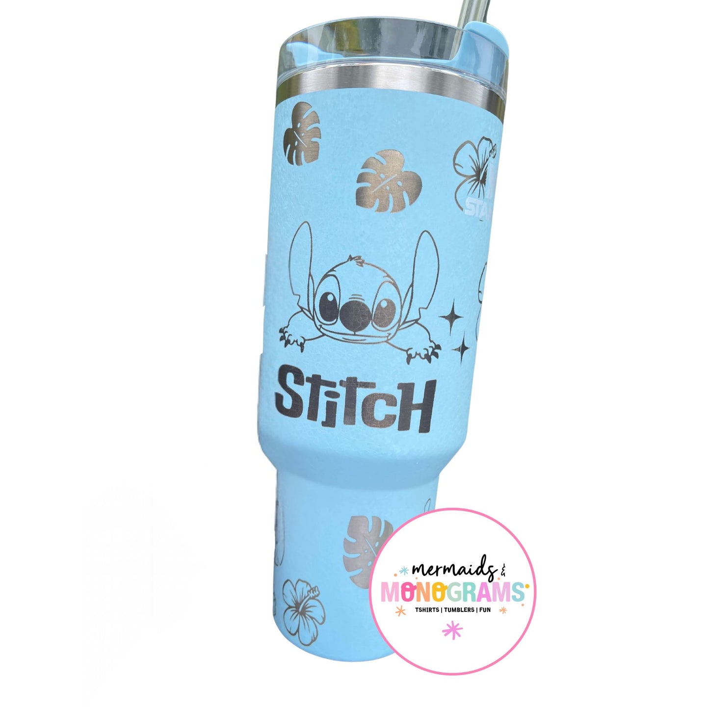 Back of tumbler with “Stitch” name engraving and leaf motifs
