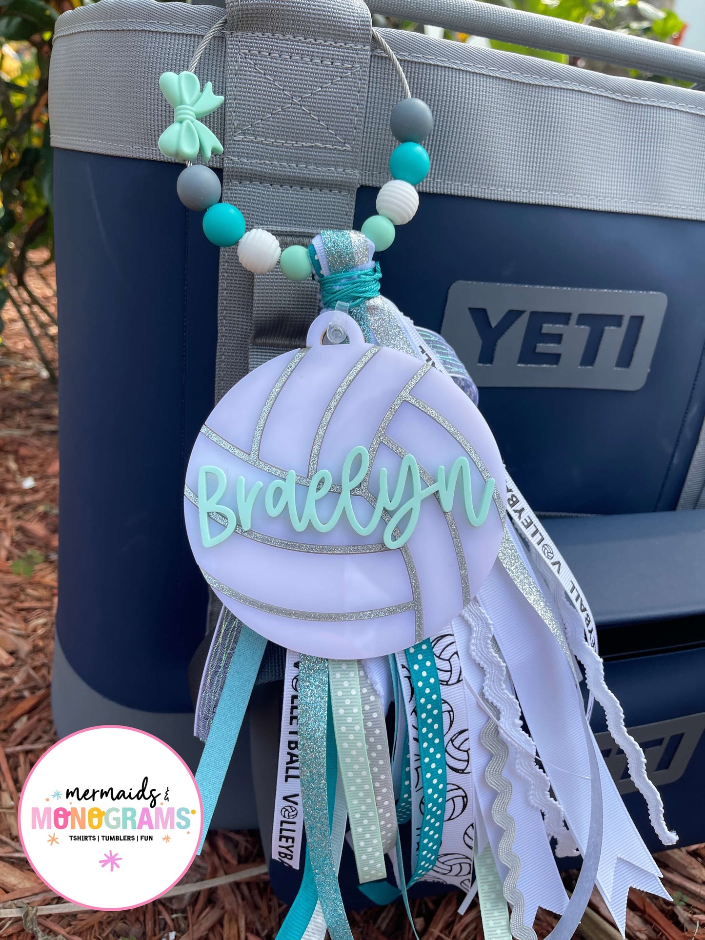 Volleyball themed keychain with 'Braelyn' on a YETI cooler