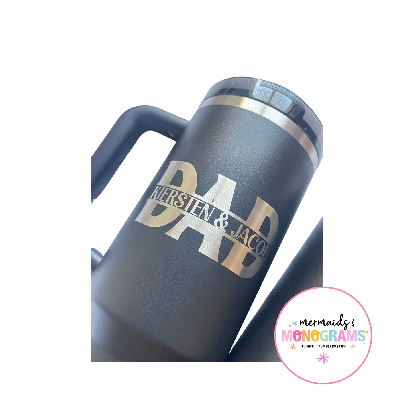 Close-up of "DAD" tumbler with engraved names