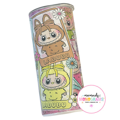 Labubu floral tumbler with brown and yellow characters in daisy background