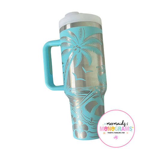 Stainless steel tumbler with palm tree and beach laser-etched details