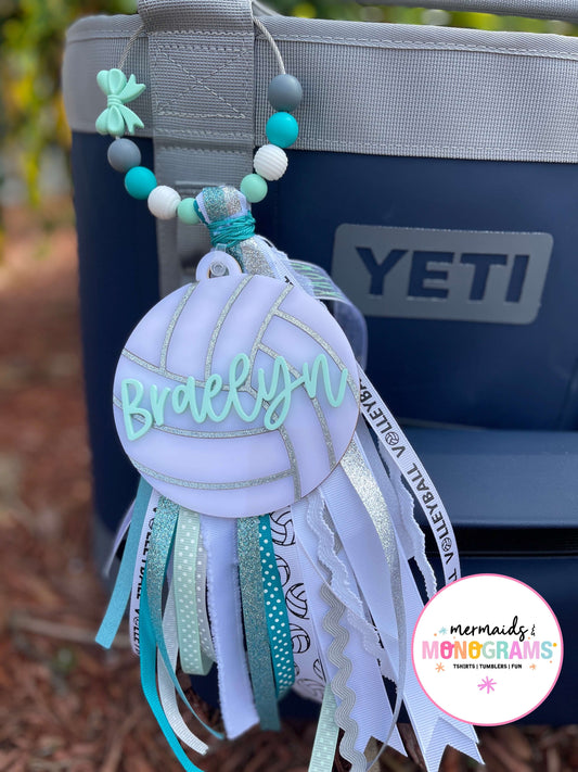 Decorative keychain with 'Brooklyn' on a YETI cooler