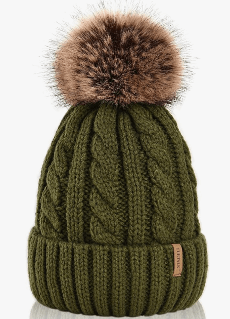 Green knit beanie with a brown fur pom-pom on a white background