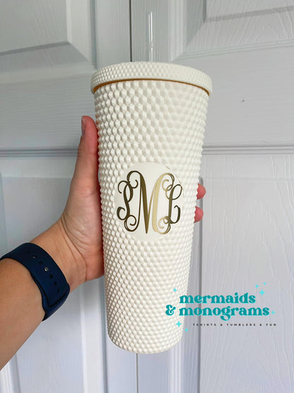 White studded tumbler with gold monogram decal