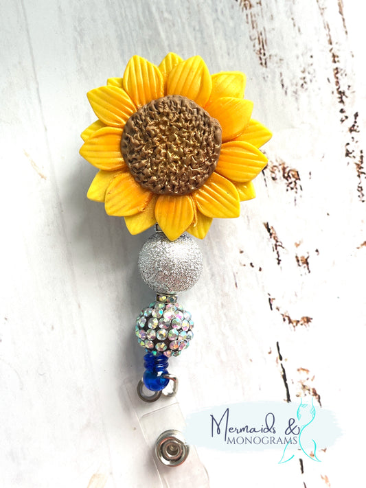 Clay Sunflower Badge Reel